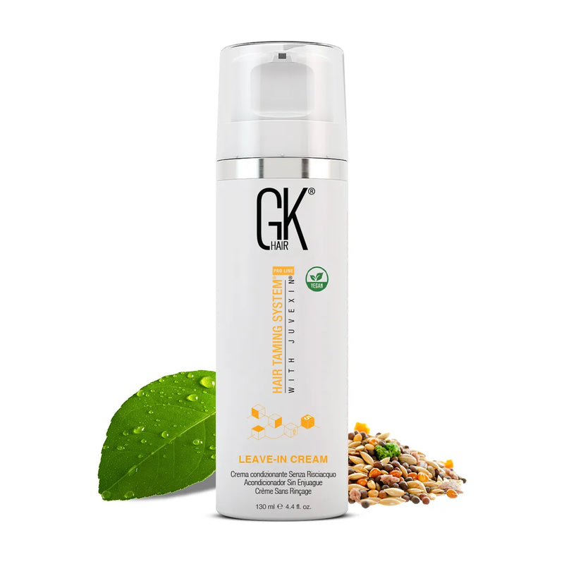 GK Hair Leave-In Conditioner Hair Cream Pro 130 ml white vegan pump bottle beside a green leaf and mixed grains
