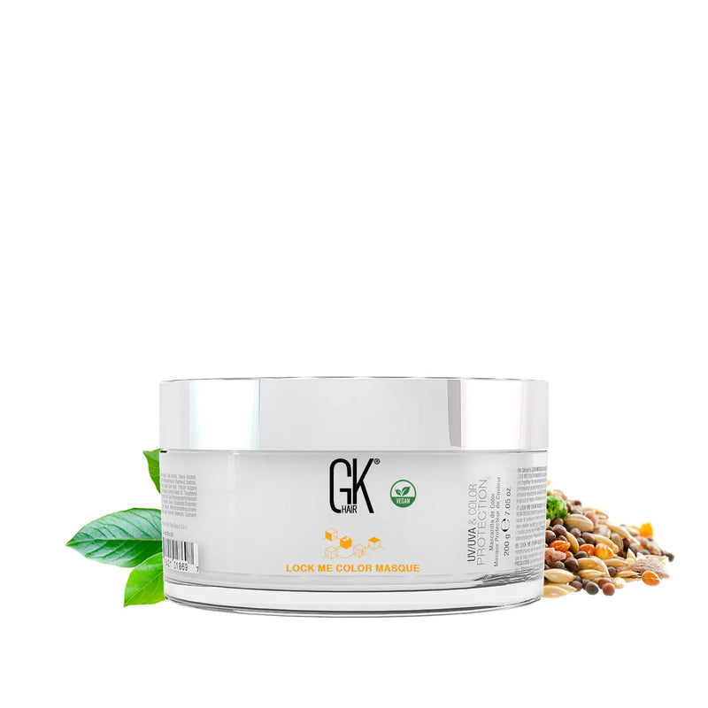GK Hair Lock Me Color Masque Pro 200 g jar turned to its back label, with a green leaf and mixed seeds alongside